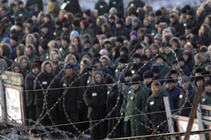 Inmates of a prison camp for women are seen through the razor wire before a 'Lady Spring 2009' beauty contest in Selo Gornoye